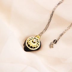 CIRCLE OF ELEGANCE GOLD PLATED SILVER PENDENT WITH LINK CHAIN