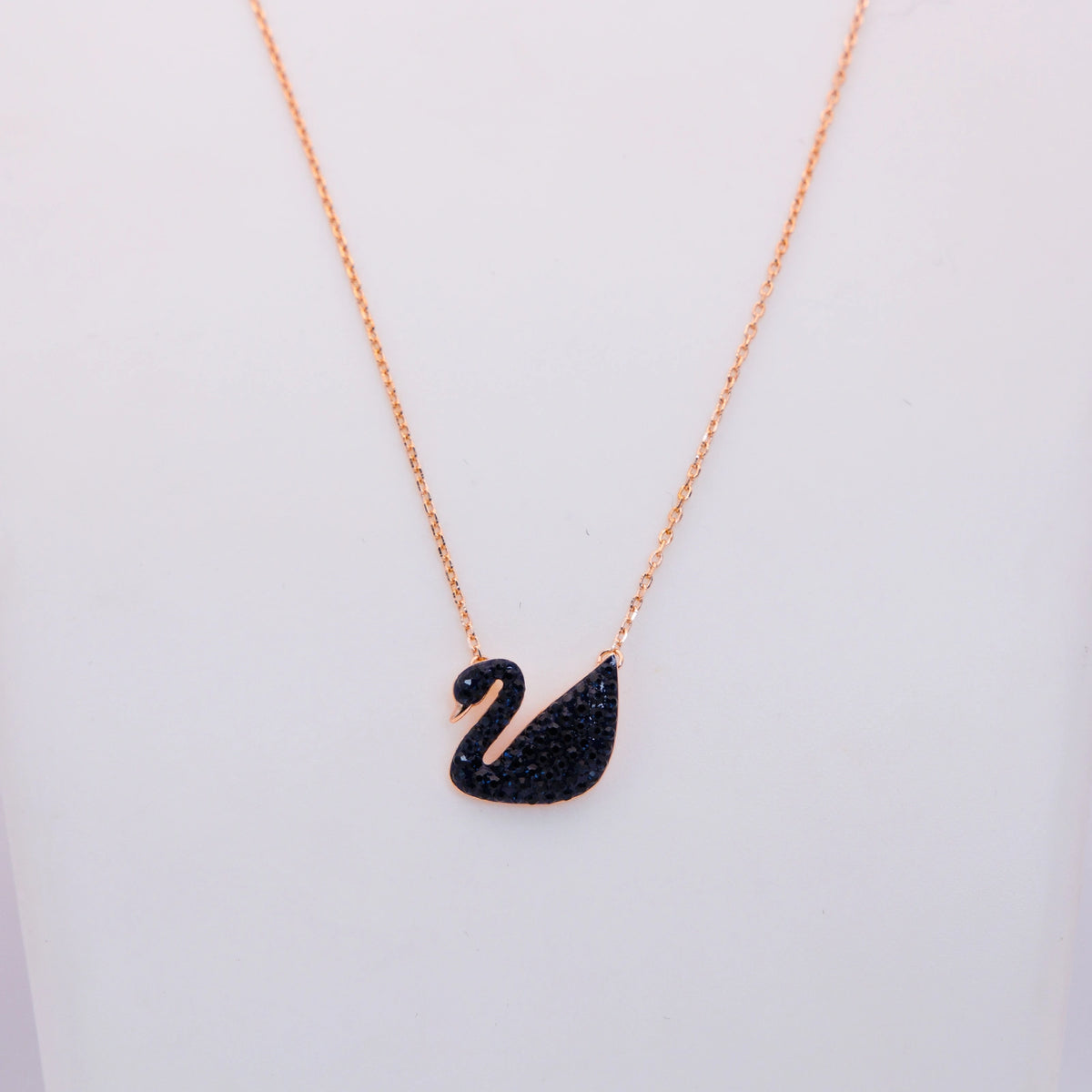 NIGHT SWAN SILVER PENDENT WITH ROSE GOLD LINK CHIAN